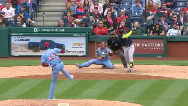 Marcell Ozuna hits a home run against the Phillies